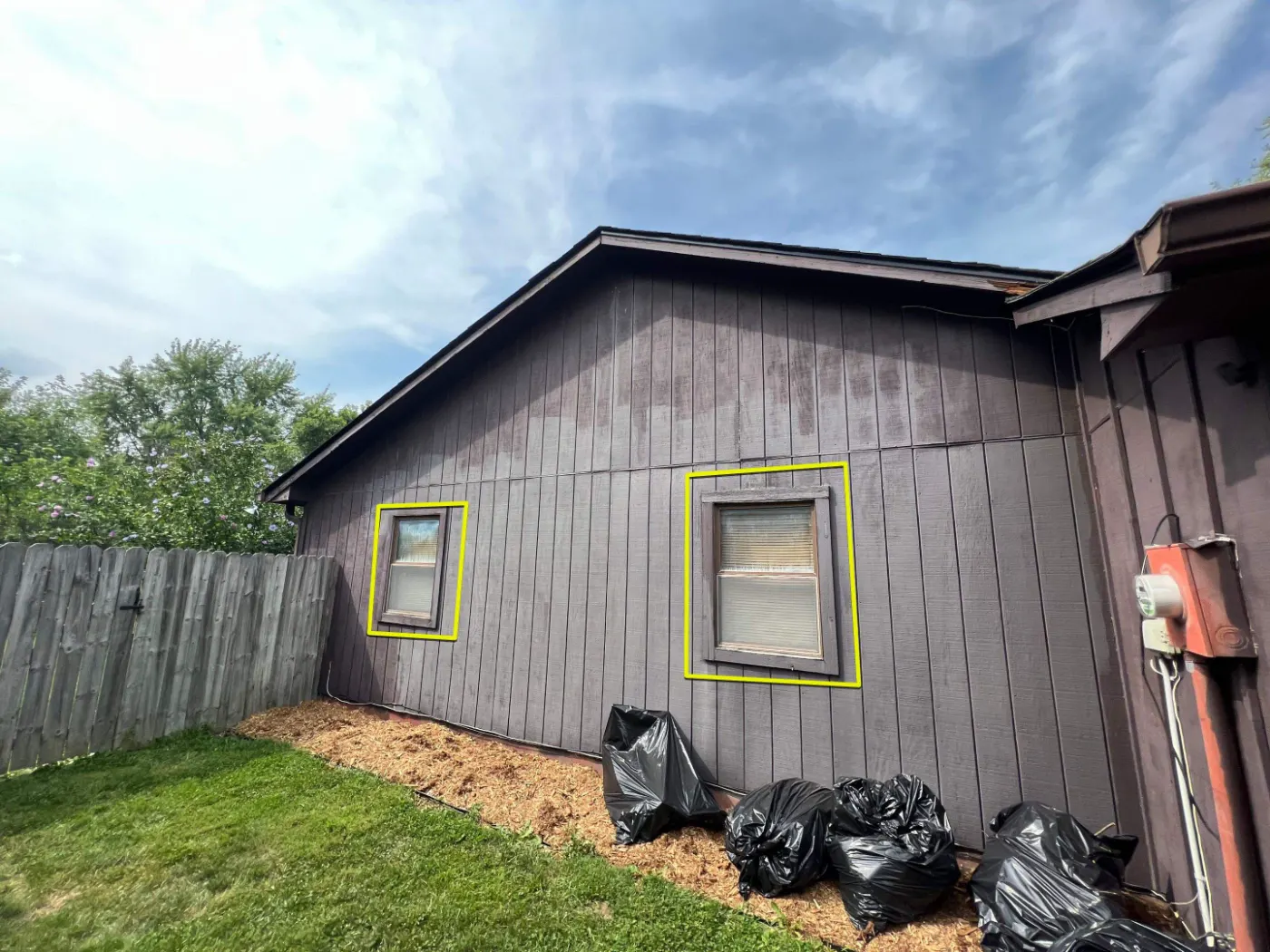 Storm-damaged window documented in Broad Ripple