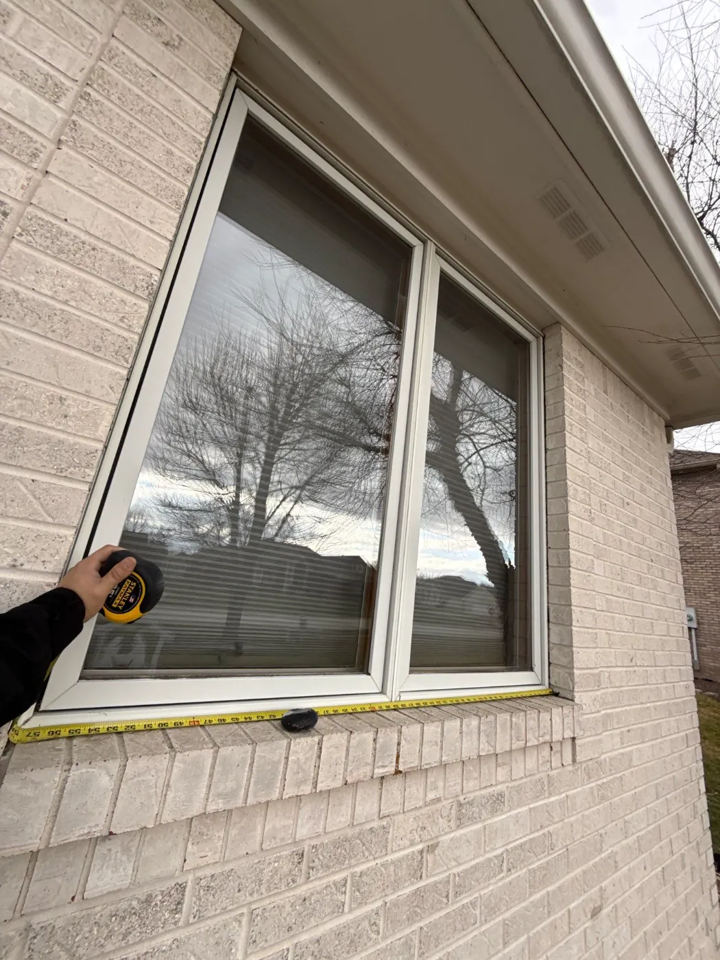 Window replacement documented in Broad Ripple